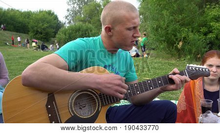 Kursk, Russia - June 4, 2017: Man lead guitarist playing guitar 