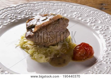 Saltimbocca Veals In Rich Neapolitan Sauce And Tagliatelle Pasta