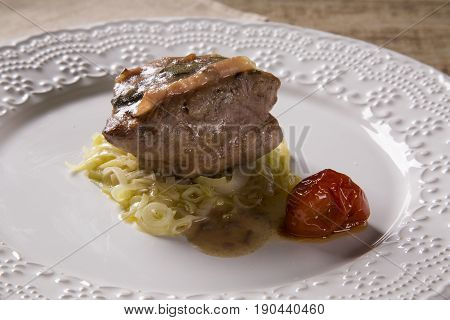 Saltimbocca Veals In Rich Neapolitan Sauce And Tagliatelle Pasta