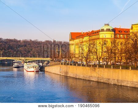 Hitorical building of Faculty of Law on Dvorak's Embankment at Vltava River. Part of Charles University in Prague, Czech Republic, Europe.