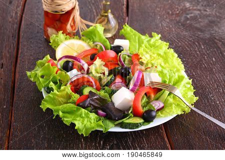 Fresh vegetables on wooden and blur background.