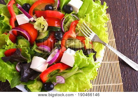 Fresh vegetables on wooden and blur background.