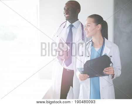 Doctors analyzing an x-ray in a meting. Doctors