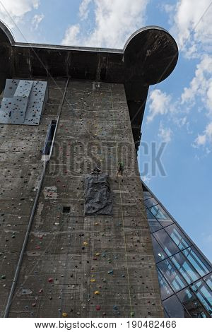 VIENNA, AUSTRIA-JUNE 01, 2017: Climbing at the large artificial wall at the House of the Sea, Vienna, Austria