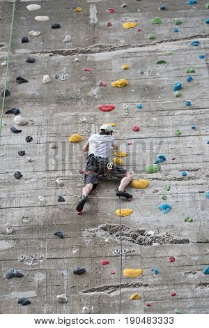 VIENNA, AUSTRIA-JUNE 01, 2017: Climbing at the large artificial wall at the House of the Sea, Vienna, Austria