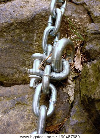 Detail Of Steel Bolt Anchor Eye In Sandstone Roc Hold Steel Chain.