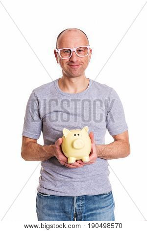 Man In Gray Shirt  With Pink Glasses And Piggybank