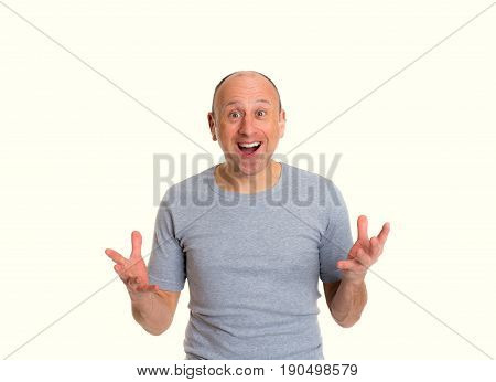 Baldheaded Man With Open Hands Looking Surprised