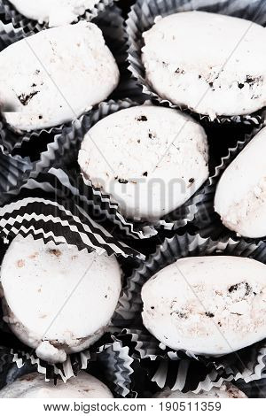 Tasty White Macaroons On Table