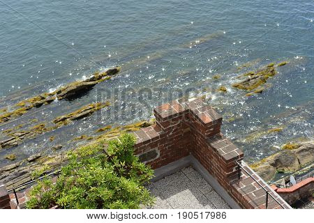 Terrace of a castle that stands against the rocks