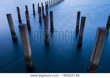 Abstract abandon sea port claim scean in blue ocean