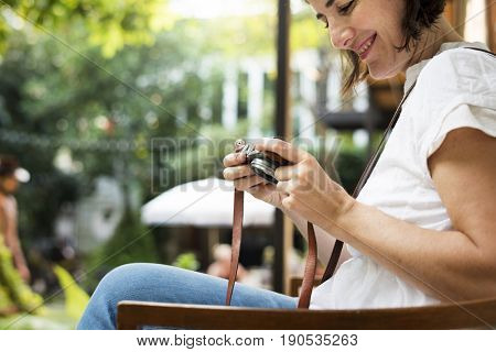 Woman traveler photographer holiday lifestyle trip