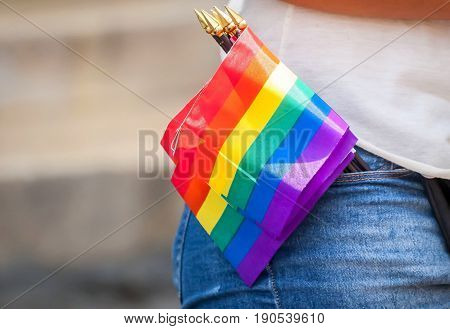 TEL AVIV, ISRAEL. June 9, 2017. Girl selling LGBT rainbow flags in the street due to the Gay Pride Parade in Tel Aviv 2017.