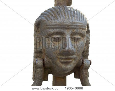 Roman man head antique brass knocker. The face of a medieval warrior from bronze with rust serves as a handle on a large iron gate isolated over a white backgroud