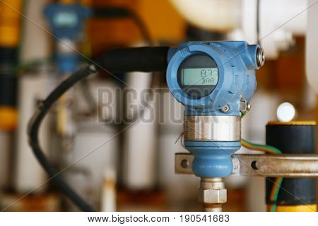 Pressure transmitter in oil and gas process, Send signal to controller and reading pressure in the system, Electronic transducer and sent data from production process to Processor Logic Controller.