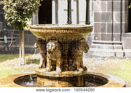 Inside Fountain On The Entrance Of The Old Medieval Benedictine Abbey In Maria Laach, Germany, With