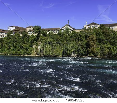 The Rhine river just above the Rhine Falls in Switzerland in summertime.