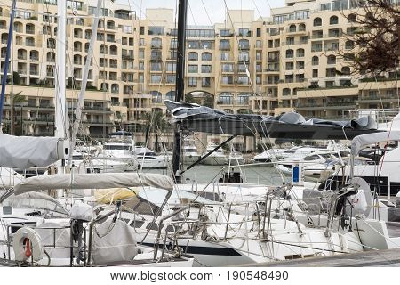 Sailboats and yachts moored at Portomaso Marina in St. Julian, Malta