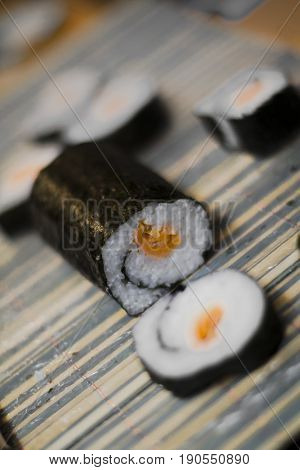 Fresh maki sushi with smoked salmon in it