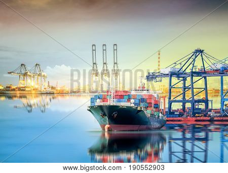 International Container Cargo ship with working crane bridge in shipyard background logistic import export background and transport industry.