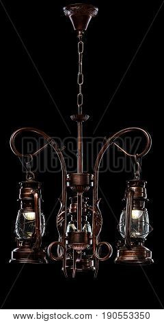 antique bronze iron-shod chandelier isolated on black background. Large chandelier for the living room interior