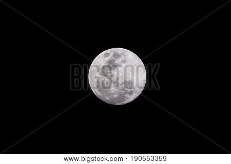 close up of full moon in night sky