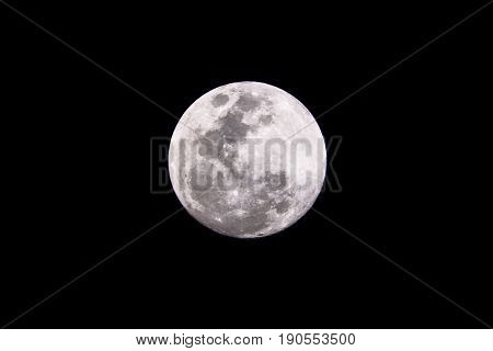 close up of full moon in night sky