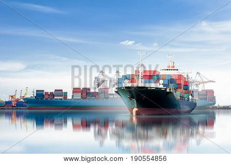 International Container Cargo ship with working crane bridge in shipyard background logistic import export background and transport industry.
