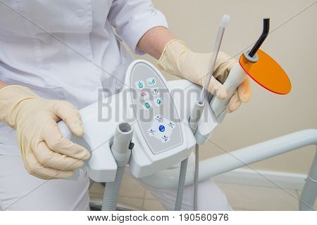 Dental UV curing light lamp . Ultraviolet polymerization Light Tool With Orange blocking glass. tooth care concept