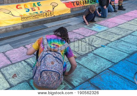 Adelaide, AU - June 10, 2017: South Australians gather at Parliament House and Rundle Mall to protest Trump's assumed support for laws discriminating against LGBTI people in the name of religious freedom.
