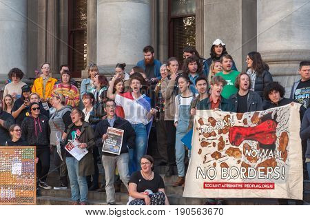 Adelaide, AU - June 10, 2017: South Australians gather at Parliament House and Rundle Mall to protest Trump's assumed support for laws discriminating against LGBTI people in the name of religious freedom.
