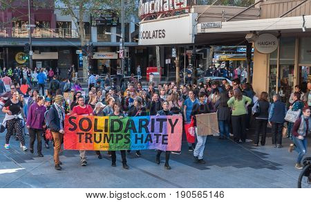 Adelaide, AU - June 10, 2017: South Australians gather at Parliament House and Rundle Mall to protest Trump's assumed support for laws discriminating against LGBTI people in the name of religious freedom.