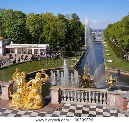 Petergof, Russia - June 5, 2017: The Grand Cascade and Samson Fountain at the Grand Peterhof Palace. These palaces and gardens are sometimes referred as the -Russian Versailles-. Background: The Sea Canal.