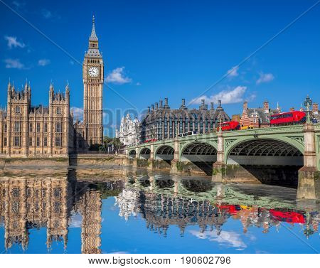 London With Red Buses Against Big Ben In England, Uk