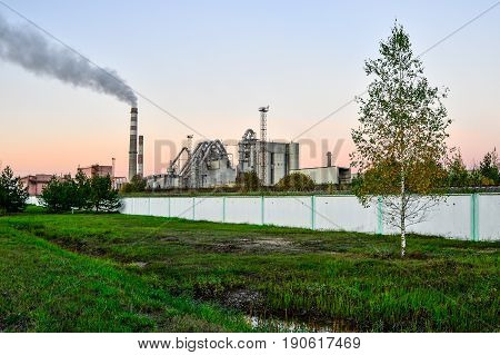 Pollution of atmospheric air from the chimneys of plants.