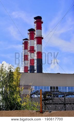 Pollution of atmospheric air from the chimneys of plants.