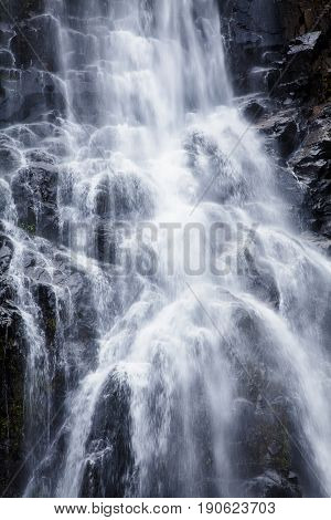Close up waterfall Natural background waterfall Colorful leaves waterfall thailand tropical Khao Nan National ParkSunanta Waterfall Nakhon Si Thammarat Thailand.
