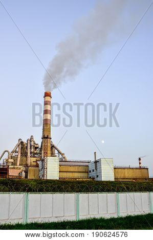 Pollution of atmospheric air from the chimneys of plants.