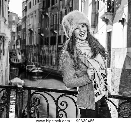 Happy Tourist Woman In Venice, Italy In Winter Having Excursion