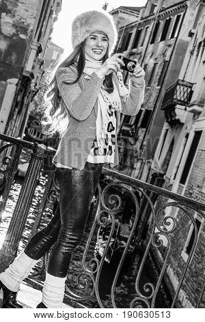 Traveller Woman In Venice Taking Photo With Digital Camera