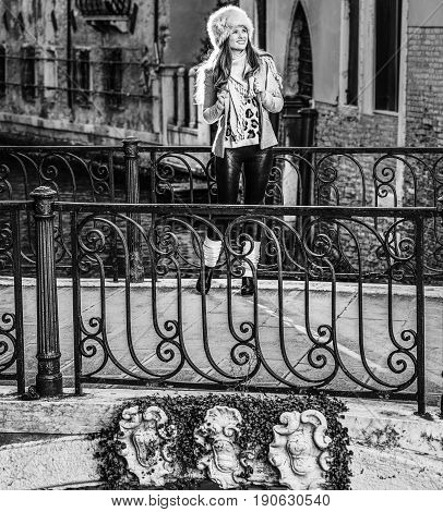 Traveller Woman In Venice, Italy Looking Into The Distance