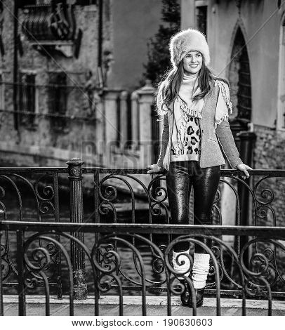 Tourist Woman In Venice, Italy In Winter Looking Into Distance