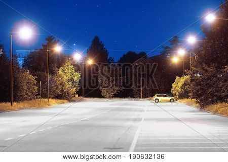 Rovigo, Italy, June, 9, 2017: night landscape with the image of empty parking in Rovigo, Italy