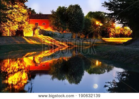 Rovigo, Italy, June, 9, 2017: night landscape with the image of channel in Rovigo, Italy