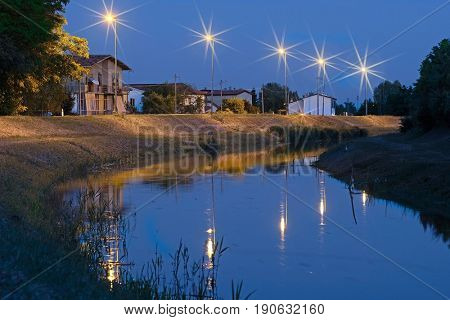 Rovigo, Italy, June, 9, 2017: night landscape with the image of channel in Rovigo, Italy
