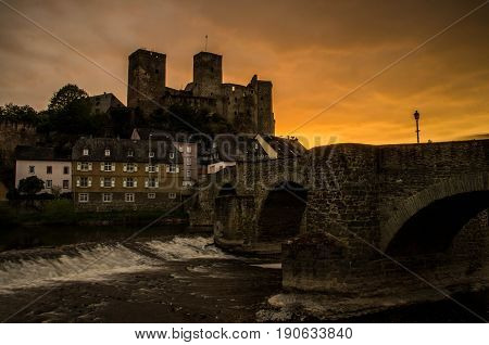 Runkel, Germany - April 23 2017: Burg Runkel during sunset with dramatic sky in Runkel, Hessen, Germany.
