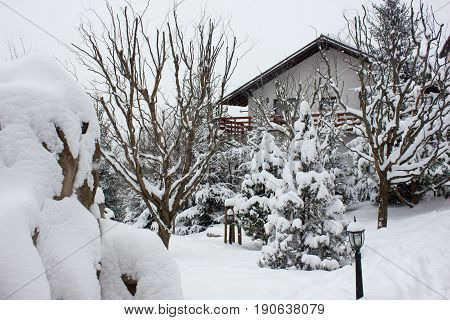 Winter ski chalet and cabin in snow mountain