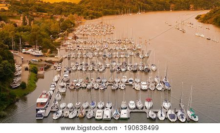 Pier of yachts and ships in Rochefort - en - Terre. River in Brittany. France