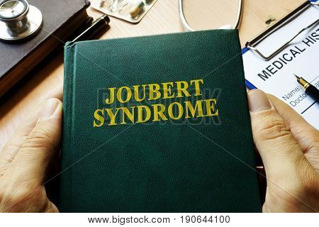 Book with title Joubert Syndrome on a table.