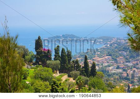Beautiful Nature Landscape of the Alpes-Maritimes. Aerial View of bay Luxury resort Villefranche-sur-Mer on French Riviera at Mediterranean Sea. Amazing Horizontal wallpaper. Europe. France.